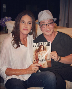 Dr. Harrison Lee with Kaitlyn Jenner holding her magazine cover for Vanity Fair